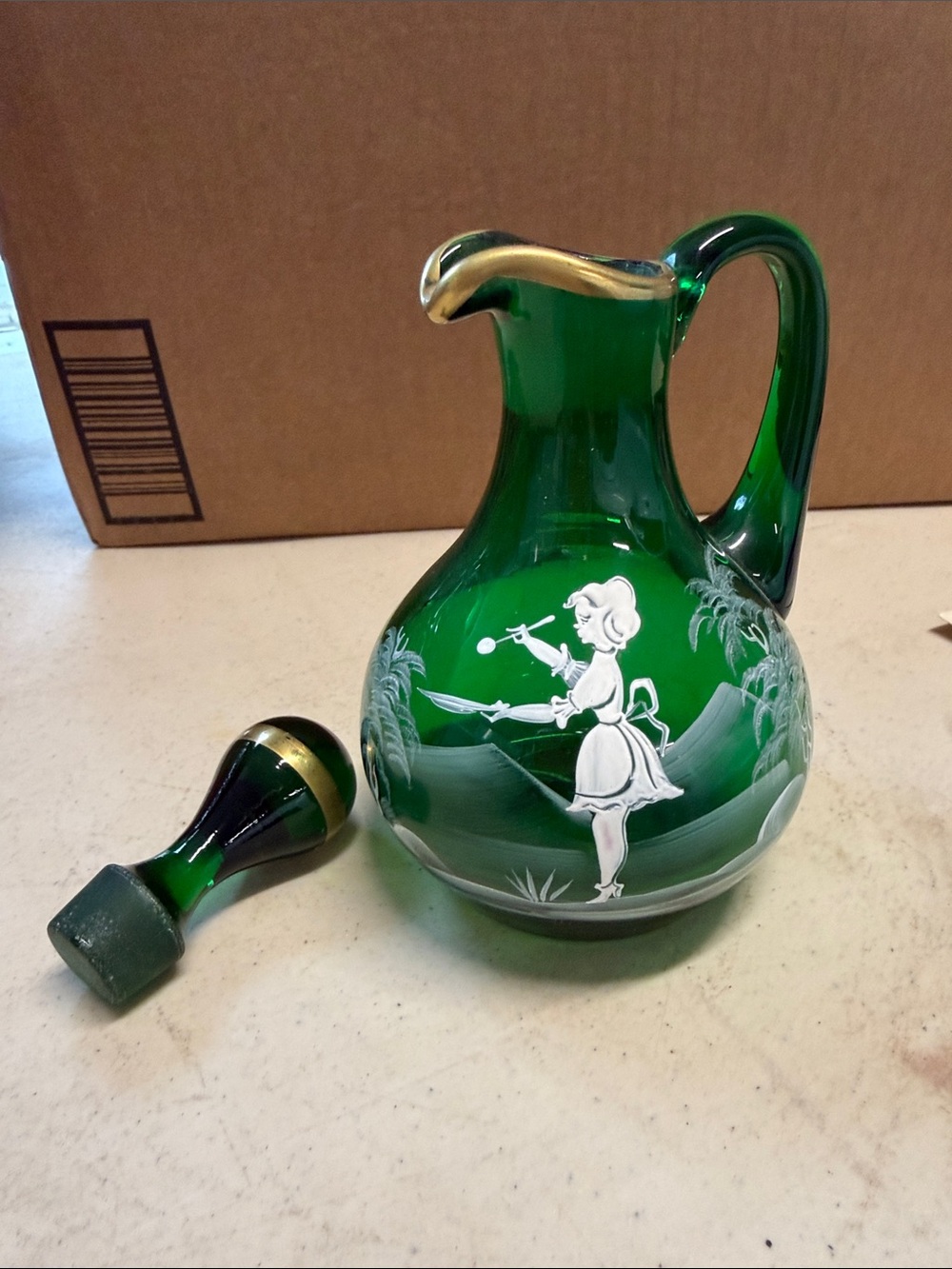 BOHEMIAN CZECHOSLOVAKIA GREEN CRUET WITH WHITE MARY GREGORY STYLE DECORATION